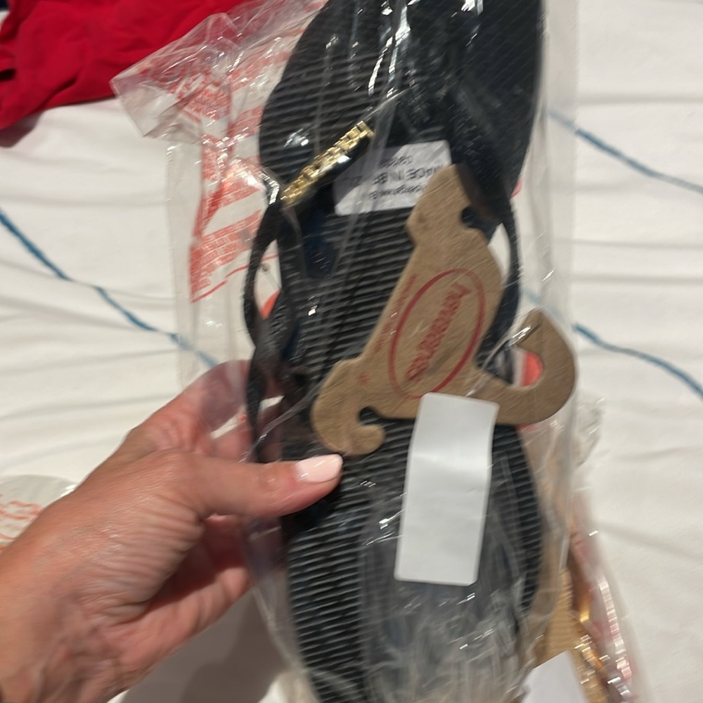 Brand new Havaianas sandals-2 pair in size 7. White $30 /black $30